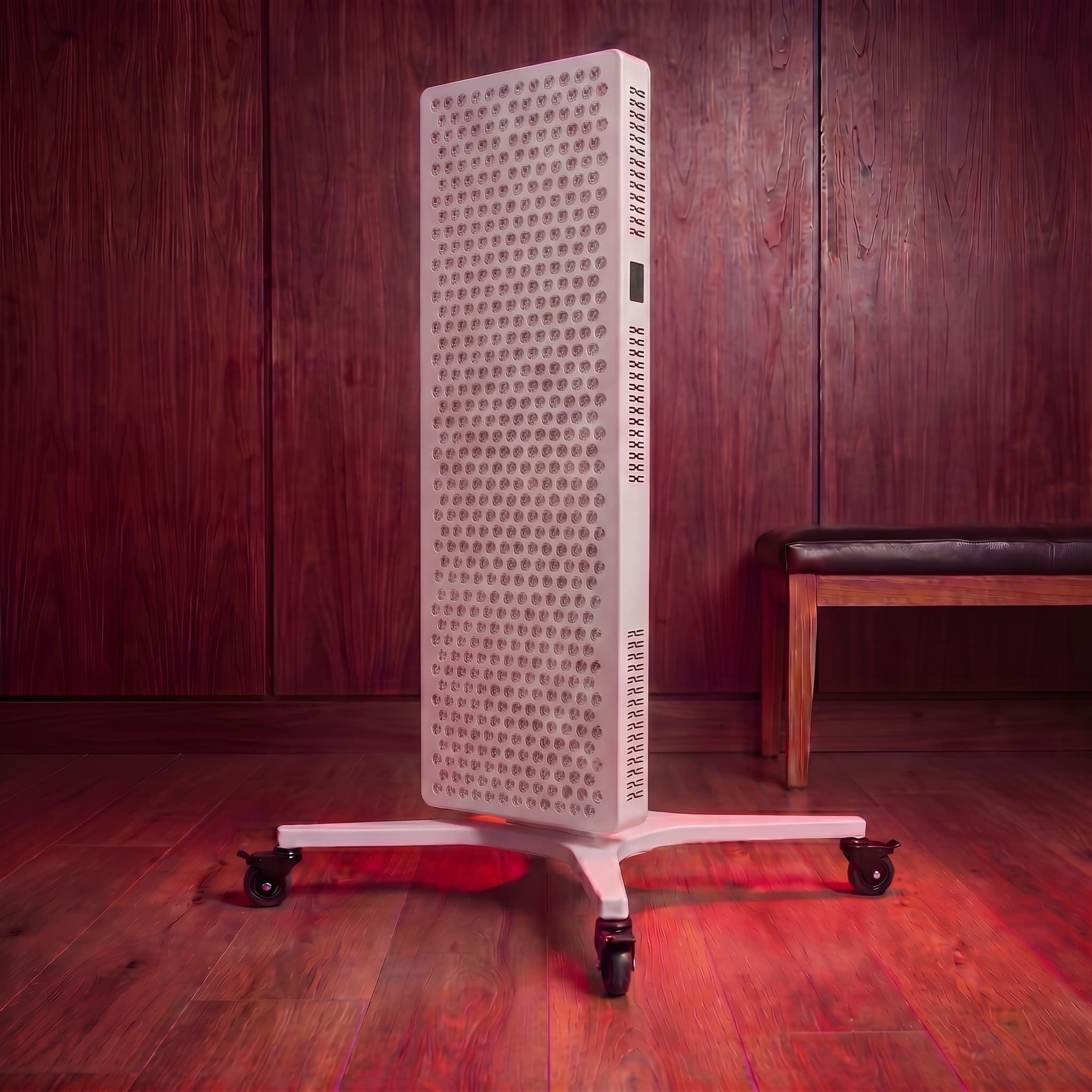 RLPRO 2000 on the electric stand in a warm mahogany wellness room — alternate environment showing the panel in a different setting